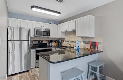 Crystal Beach Condo | 1st Floor Crystal Beach Condo! Steps to Beach, Pool, Hot Tub, Poolside Patio.