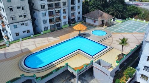 Taman Haji Zainal Apartment | 2-5pax Sunshine BeachFront, Wifi, 50"TV, FREE PARKING & POOL