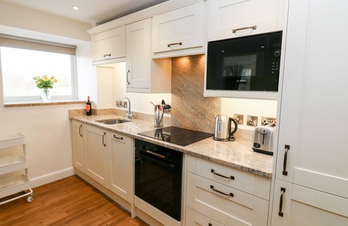 Rastrick Cottage | 2 BARN COTTAGES, family friendly, with a garden in Norwood Green