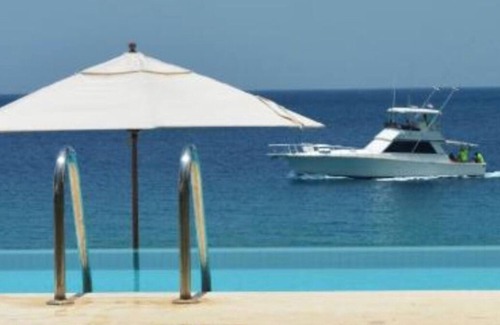 La Esplanada Condo | 2-bedroom 3 bath beachfront resort. Free Restaurant Breakfast, Airport Transport