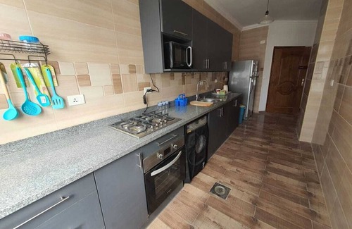 Al Duqqi Apartment | 2-bedroom apartment in terrific New Cairo with WiFi