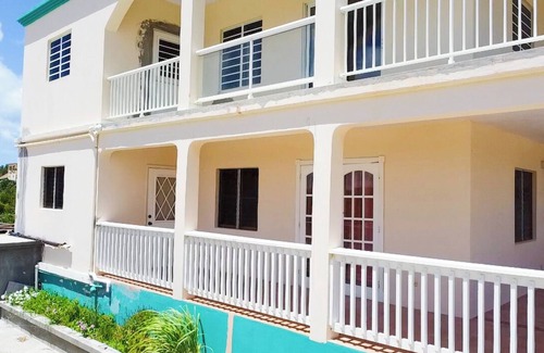 George Hill Villa | 2-Bedroom/Bath Comfortable AI Residence- nA/C, WiFi and 7 mins away from beach.