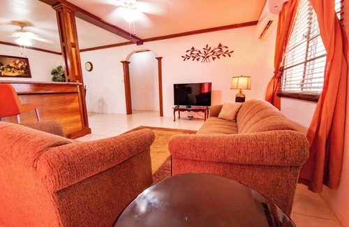 George Hill Villa | 2-Bedroom/Bath Comfortable AI Residence- nA/C, WiFi and 7 mins away from beach.