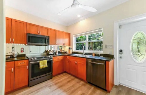 West Bay House | 2 bedroom condo with pool close to the beach