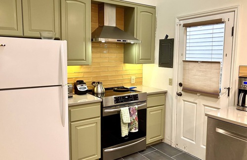 Bitter Lake House | 2 bedroom peaceful home with large backyard and modern amenities!