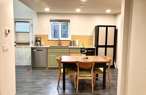 Bitter Lake House | 2 bedroom peaceful home with large backyard and modern amenities!