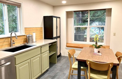 Bitter Lake House | 2 bedroom peaceful home with large backyard and modern amenities!