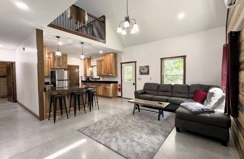 Dennison Cabin | 2 Bedroom With Loft - 2.25 miles from Enchanted Acres Wedding Venues.