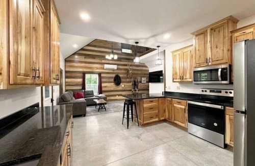 Dennison Cabin | 2 Bedroom With Loft - 2.25 miles from Enchanted Acres Wedding Venues.