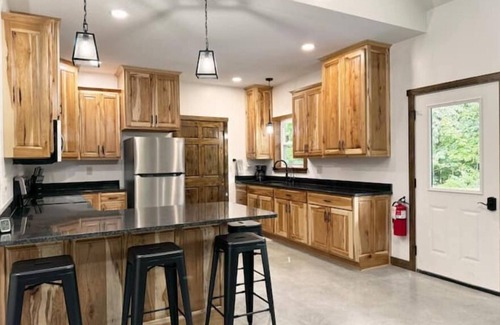 Dennison Cabin | 2 Bedroom With Loft - 2.25 miles from Enchanted Acres Wedding Venues.