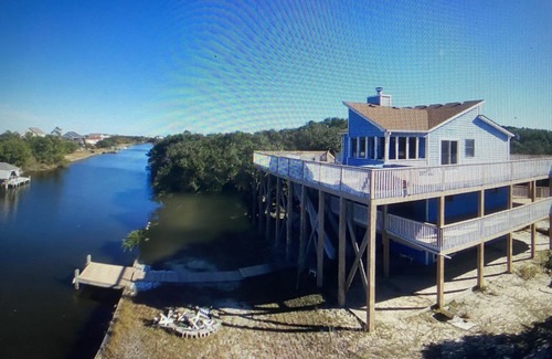 Carova Beach House | 2 Free beach parking passes! Waterfront Hot Tub Boat dock Pet friendly 360 Decks