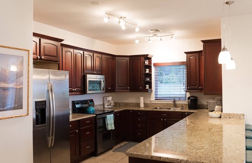 Estate Enighed Condo | 2 master suites. 4 bedroom. Walk to town. Total rennovation. Poolside villa.