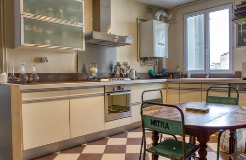 Saint-Vincent-de-Paul Apartment | 200 m² with views of the Sacre Coeur and the rooftops of Paris