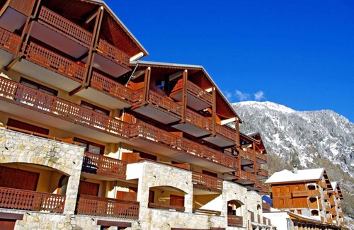 Champagny-en-Vanoise Apartment | 200m from resort center, 3rd floor, balcony, fireplace or stove, parking, tv, ski locker, 54m²