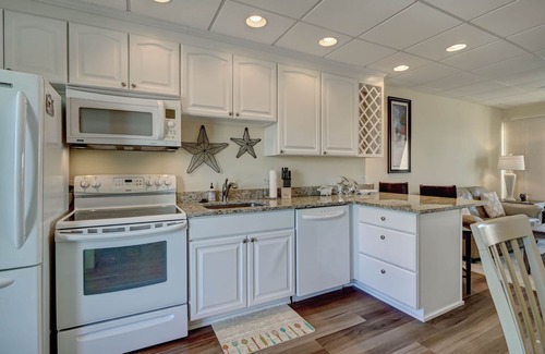 South End Condo | 202 Banks Channel - Beautifully updated condo w/sound front views. Sleeps 4.