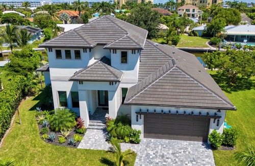 Marco Island House | 2024 4 Bed Home (Option- Golf Carts Rental) (Car rental option)- Water view with Heated Pool , Outdoor Kitchen/Bar