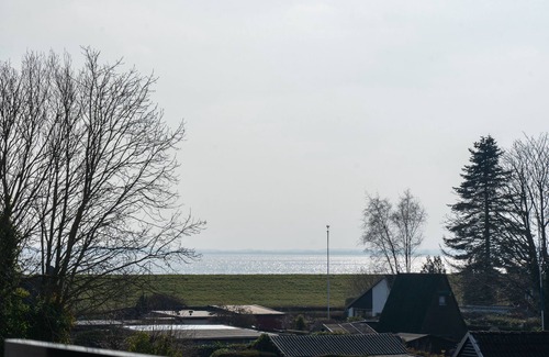 Innenhafen Apartment | 210 Apartment Langeoog with balcony and sea view as well as lake view - 210 Fewo Langeoog