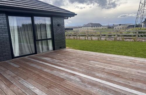West Melton House | 23 Texel Crescent Black brick house