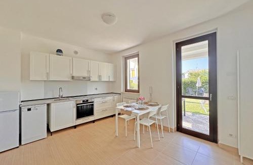 Numana Apartment | 237 - Residence ADAMO ed EVA - bilo al piano terra con ampio GIARDINO - 2 PISCINE, SPIAGGIA WHITE BEACH CLUB E MINICLUB INCLUSI nel prezzo