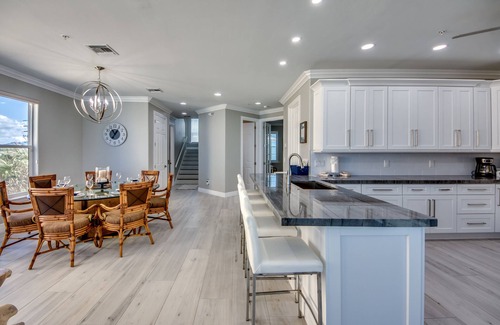 Mid Island House | 251 Key West Court: Luxurious Beachfront Home with Pool
