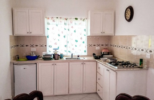 Urbanizacion Tavarez Villa | 2BD/1Bath guest-friendly villa near everything, Wi-Fi, pool, A/C, TV