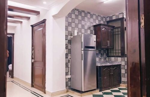 New Delhi Apartment | 2BHK- GK 2 near M Block Market! by HostMyStay