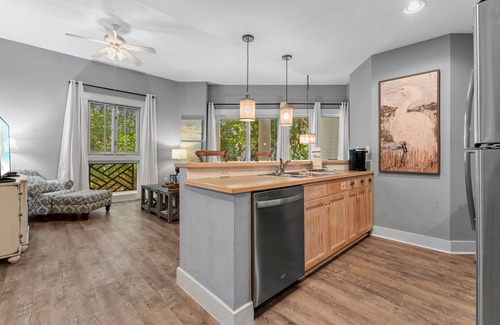 Baytowne Wharf Condo | 2BR Condo at Baytowne! Tram to Beach, Tropical Pool + Hot Tub, Walk-out Patio