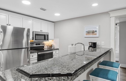 Baytowne Wharf Condo | 2BR Condo Near Baytowne! Bay Views, Steps to Wharf, Pool/Hot Tub, Beach Tram.