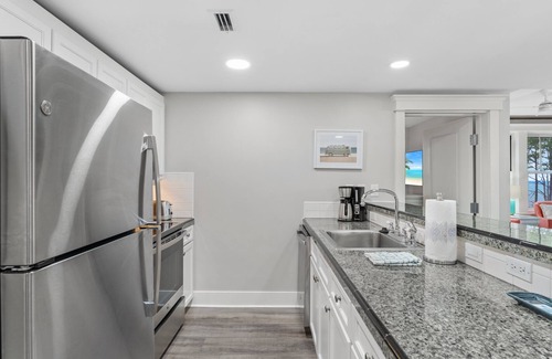 Baytowne Wharf Condo | 2BR Condo Near Baytowne! Bay Views, Steps to Wharf, Pool/Hot Tub, Beach Tram.