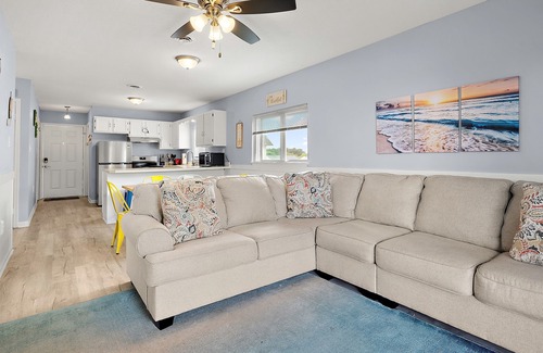 Caine Woods House | 2BR Family Friendly Condo w/Large Balcony, Partial Ocean Views, Outdoor Pool
