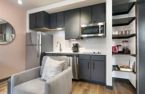Central Business District Hotel | 2BR Haven Condo Steps to Mississippi River