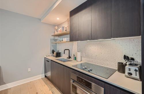 Rainey Street Historic District Apartment | 2BR Luxury with Views and Rooftop pool in Austin