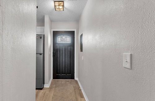 Winter Haven Condo | 2BR Waterfront Condo w/Pool access, Dock, Patio Views & 3 Miles from LEGOLAND