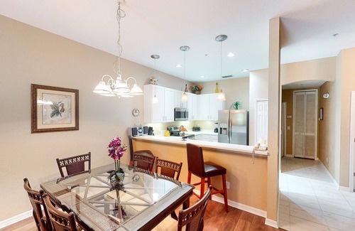Bahama Bay Condo | 2nd floor condo w/pools, restaurant, balcony, tennis court, basketball court
