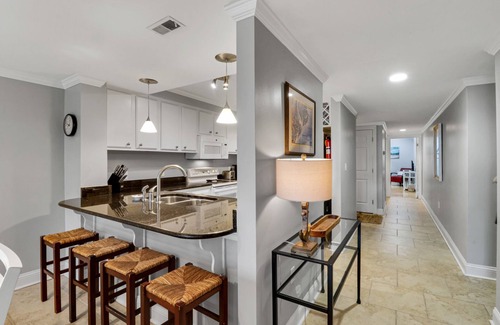 Palmetto Dunes Villa | 2nd floor renovated end unit w/stunning pool, lagoon, and ocean views!