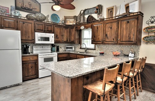 Sunset Beach House | 2nd Row House - 2 min walk to beach, oversized screened porch and ready for fun