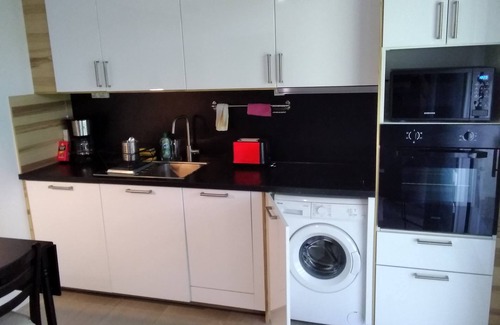 La Bocca Nord Apartment | 2p air-conditioned apartment in quiet residence with small garden