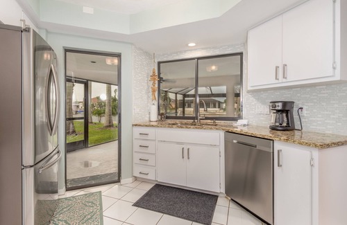 Pelican House | 3/2 updated Gulf access canal home electric heated pool & Jacuzzi - Coconut Cove