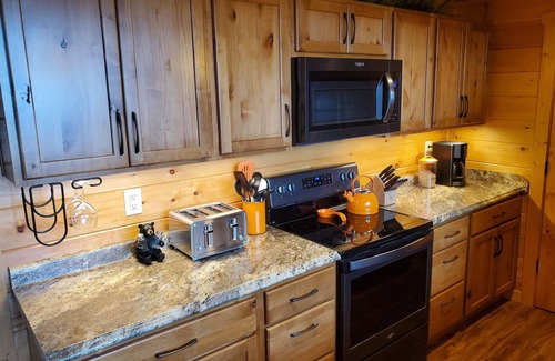 Sevierville Cabin | 3 Bed Cabin- Hot Tub, Fire Pit, Pool Table. Close to All The Fall Fun!