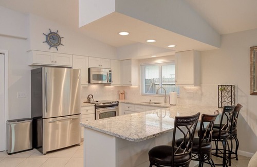 Naples Park House | 3 Bedroom, Huge Pool, Hot Tub, Screened in Lanai in the coveted 500 block