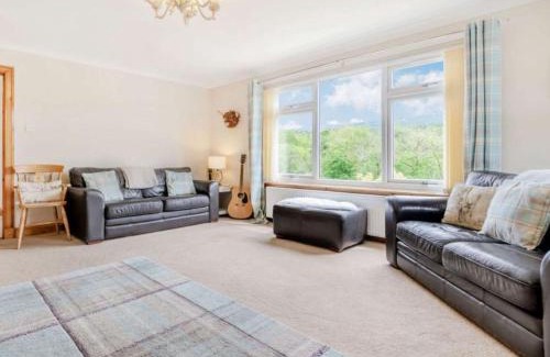 Killin Villa | 3 Bedroom luxury home, hot tub, stunning views of Killin, sitting on the River Dochart