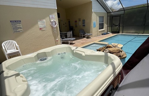 West Kissimmee House | 3 miles Disney, New Renovated 4 BR/3Ba Pool,Hot tub, Super Speed Wi-Fi,game room