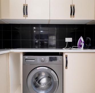 North-West District Apartment | 3BD Poolside Paradise Fast Starlink Wi-Fi Near CBD and Airport