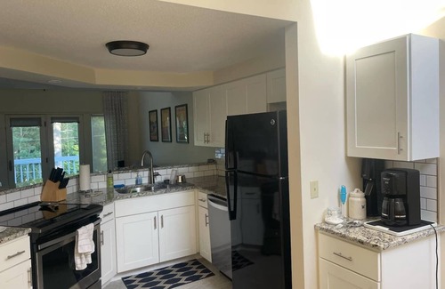 Laconia Apartment | 3BR Lake Winnipesaukee Condo with Sandy Beach