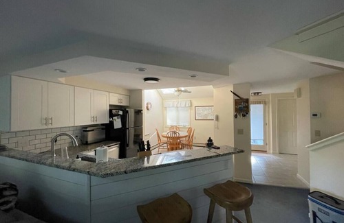 Laconia Apartment | 3BR Lake Winnipesaukee Condo with Sandy Beach