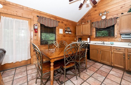 Sevierville Cabin | 3BR Sevierville Cabin Near Dollywood w/Large Covered Deck, Hot Tub, Foosball & Free Tickets