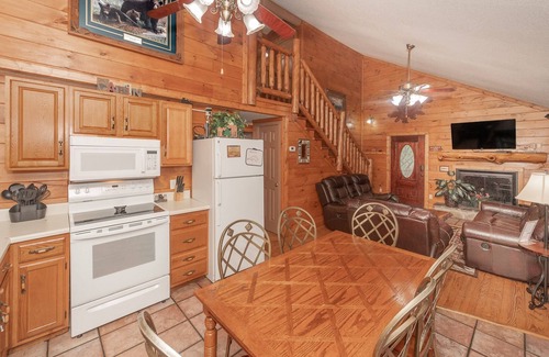 Sevierville Cabin | 3BR Sevierville Cabin Near Dollywood w/Large Covered Deck, Hot Tub, Foosball & Free Tickets