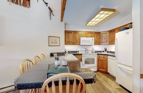 Historic District Condo | 3rd-floor ski-in/out condo with fireplace, hot tubs, & gym