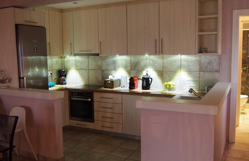 Ag. Georgios House | 4 bedroom house for 8 guests with seaview and direct access to the beach.
