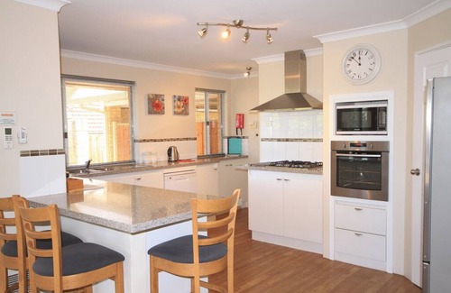 Mindarie House | 4 bedroom 2 bathroom home with large swimming pool walk to Mindarie Marina